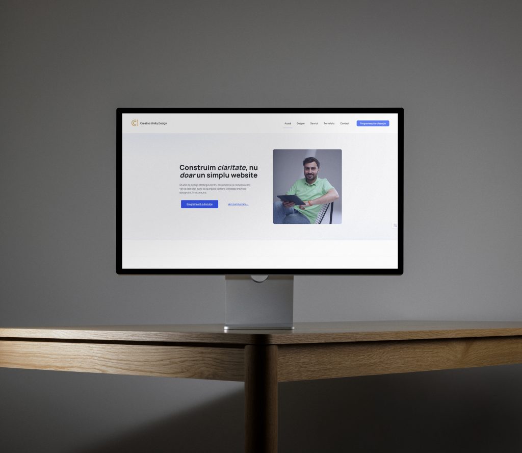 Creative Unity Design C1 afisat pe un display de studio, mockup de brand